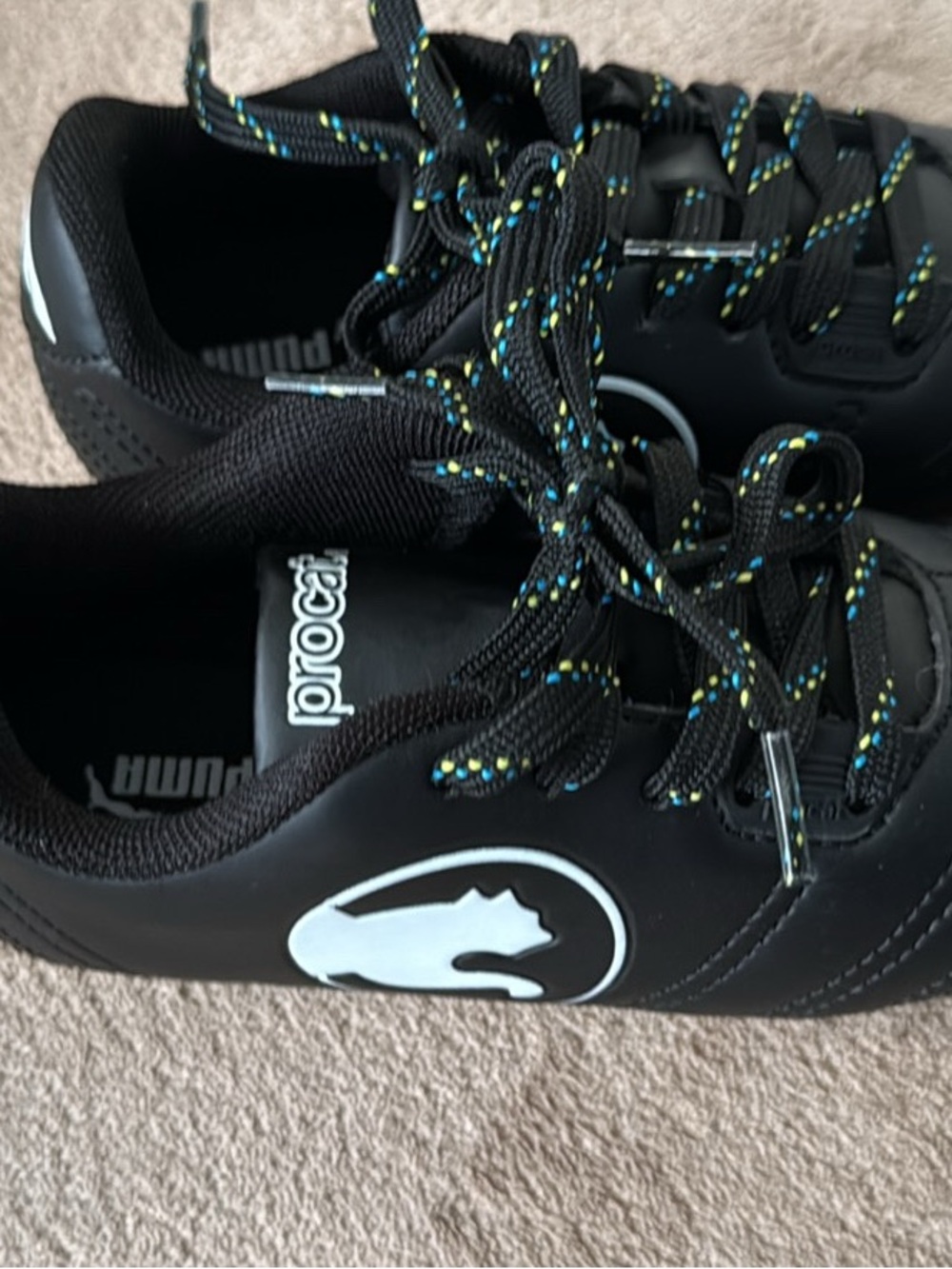 Puma Black Soccer Cleats with Multicolor Fleck Laces
